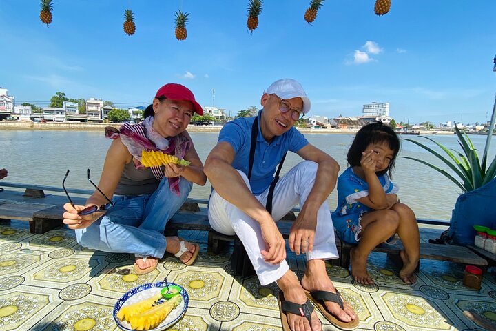 Tasting Fresh Pineapple at Can Tho Floating Market